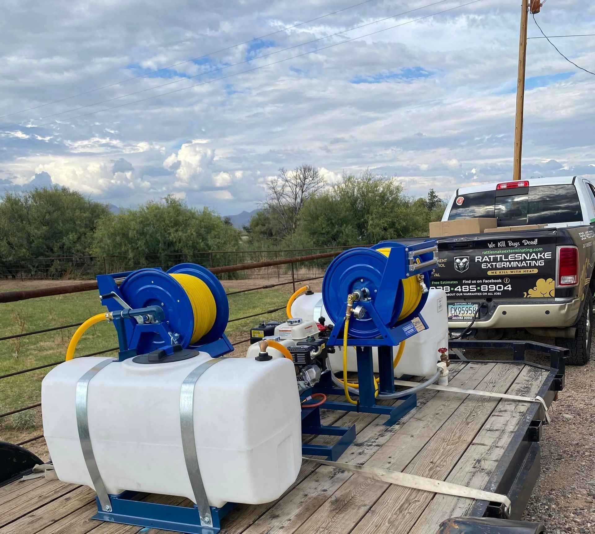 Weed spraying along a commercial fence line